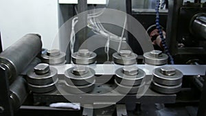 Process of manufacturing a strip of stainless steel on rolling machines.