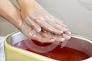 Process paraffin treatment of female hands