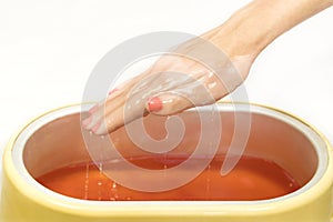 Process paraffin treatment of female hands