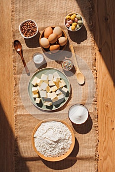 The process of preparing and decorating an Easter cupcake in the kitchen