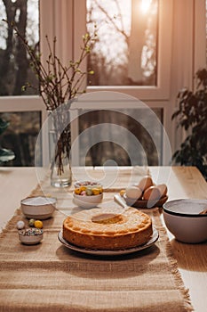 The process of preparing and decorating an Easter cupcake in the kitchen