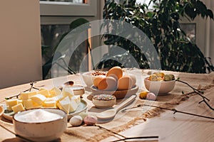 The process of preparing and decorating an Easter cupcake in the kitchen