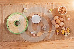The process of preparing and decorating an Easter cupcake in the kitchen