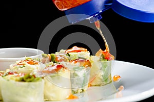 Process of preparing fresh Vegetable Spring Rolls with soy sauce
