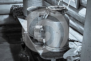The process of preparing moonshine in a village bath in a primitive moonshine distilling-apparatus