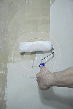 Process of priming plastered surface