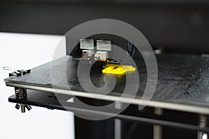 Process of printing physical plastic model on automatic 3d printer machine. Additive technologies, 3D printing and prototyping