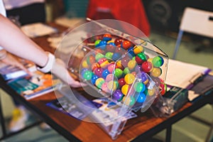 Process of prize drawings, extracting a winning numbers of lottery machine, raffle drum with a bingo balls, bingo machine and