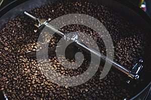 Process of roasting and mixing coffee In roaster