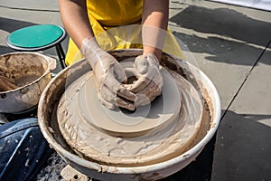 Process of rotation of potter`s wheel, hands of ceramist