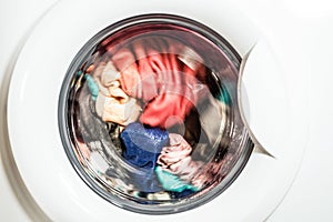 The process of washing different clothes in the washing machine