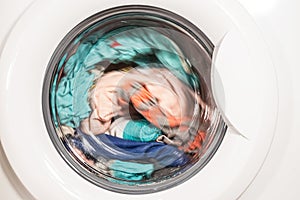 The process of washing different clothes in the washing machine