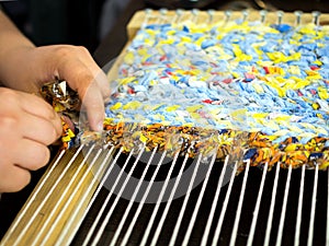 The process of weaving a traditional Russian patchwork rug