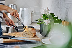 Woman cooking omelet , use induction stove and frying pan