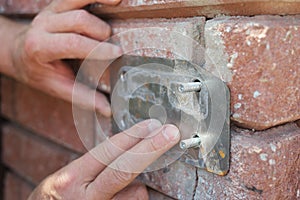 Process of wood door hinge installation.