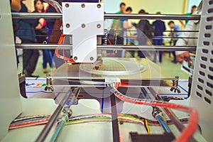 The process of working 3D printer and creating a three-dimensional object