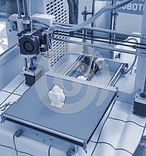 The process of working 3D printer and creating a three-dimensional object