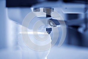 The process of working 3D printer and creating a three-dimensional object