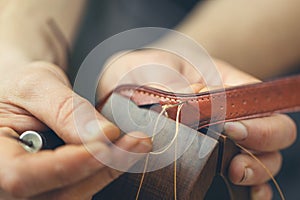 The process of working with the leather with a low depth of field