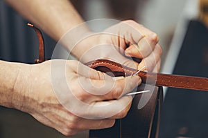 The process of working with the leather with a low depth of field