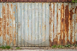 Processed collage of old rusty metal sheet texture in daylight
