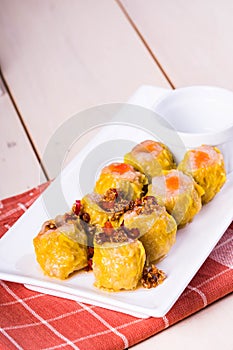 Processed siomai with chili sauce