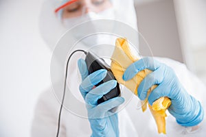 Processing computer mouse from coronavirus and germs in office cleaning service