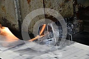 Processing and finishing of a metal plate on a surface grinding machine