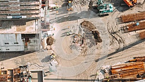 Processing Of Metal Structures Building Skeleton At Construction Site. HD Hyperlapse Aerial View On Construction Site