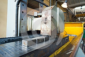 Processing of rectangular parts on a flat grinding machine, wide-angle photo.