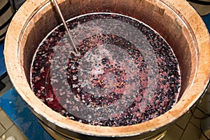 Processing wooden wine barrel  harvest red grapes