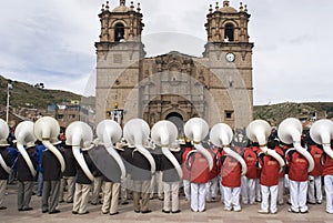 procession catholic at the festival of the Virgin Candelaria, with music and intrument puno peru photo