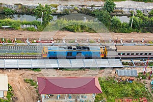 A procession of locomotives that runs on rails in Thailand