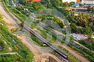 A procession of locomotives that runs on rails in Thailand