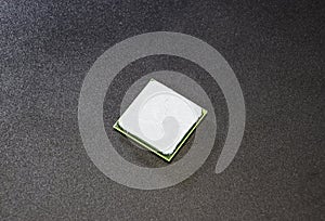 The processor of the computer with the thermal paste applied on it. Details of the computer's system unit.