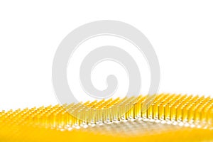 Processor isolated on white background with soft foreground. With gold-plated contacts close up. Bottom view from the pins side
