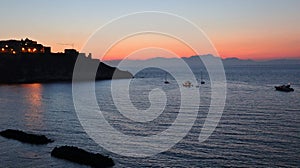 Procida â€“ Barche nella Baia di Corricella al tramonto