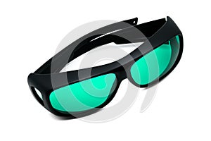 Product of black sports sunglasses with beautiful blue lenses on isolated white background. Cool fashion glasses on white