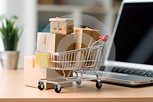 Product package boxes and shopping bag in cart with laptop