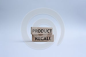 Product recall symbol. Concept words Product recall on wooden blocks. Beautiful white background. Business and Product recall
