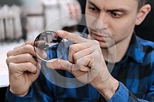 Production and adjust of new eyeglasses lens in optics