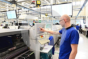 Production and assembly of microelectronics in a hi-tech factory photo