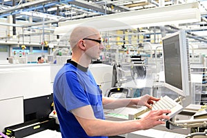 Production and assembly of microelectronics in a hi-tech factory photo