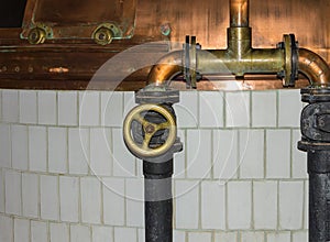 Production of beer old system of pipes with valve filling of copper vats for cooking