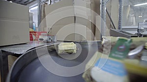 Production of cottage cheeses in factory. Production of dairy products. Milk products on automated production line