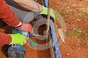 Production of formwork for concrete base foundation house with use a removable timbering