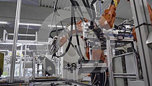 Production of headlamps on automated robotic center, robotic glueing headlamp