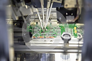 The production line of electronic board with microchip photo