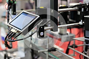 production line with HMI touch screen controller photo