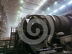 Production line of Iron ore pellets. Ore rumbling machines